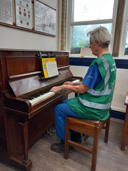 A Friend of Hebden Bridge Station tries out the new public piano